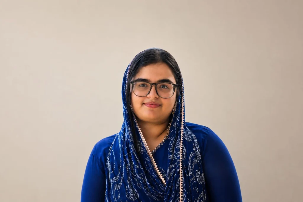 Freelance Digital marketing strategist in Ernakulam looking straight into the camera wearing a blue outfit